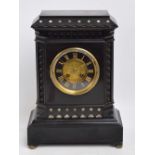 A late 19th century French black slate mantel clock,