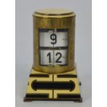 A German Art Deco style flip leaf bracket clock, with cream painted cylinder above stepped base,