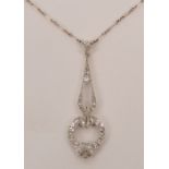 A 1920/1930s Art Deco style diamond and white metal pendant,