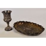 A Victorian hallmarked silver campana shaped goblet overall engraved with floral and foliate motifs,