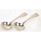 A pair of Victorian hallmarked silver fiddle pattern sauce ladles with oval bowls,