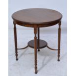 A mahogany circular occasional table with tapering reeded legs, diameter 67cm, height 71cm.