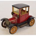 A Schuco clockwork tin model of 1917 T Ford, no.N1227, length 16cm.