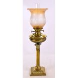 A brass table lamp modelled as a Corinthian column, raised on stepped rectangular base,