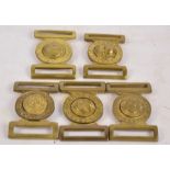 Five brass military belt buckles; Welsh Guards, Grenadier Guards, Cold Stream Guards,