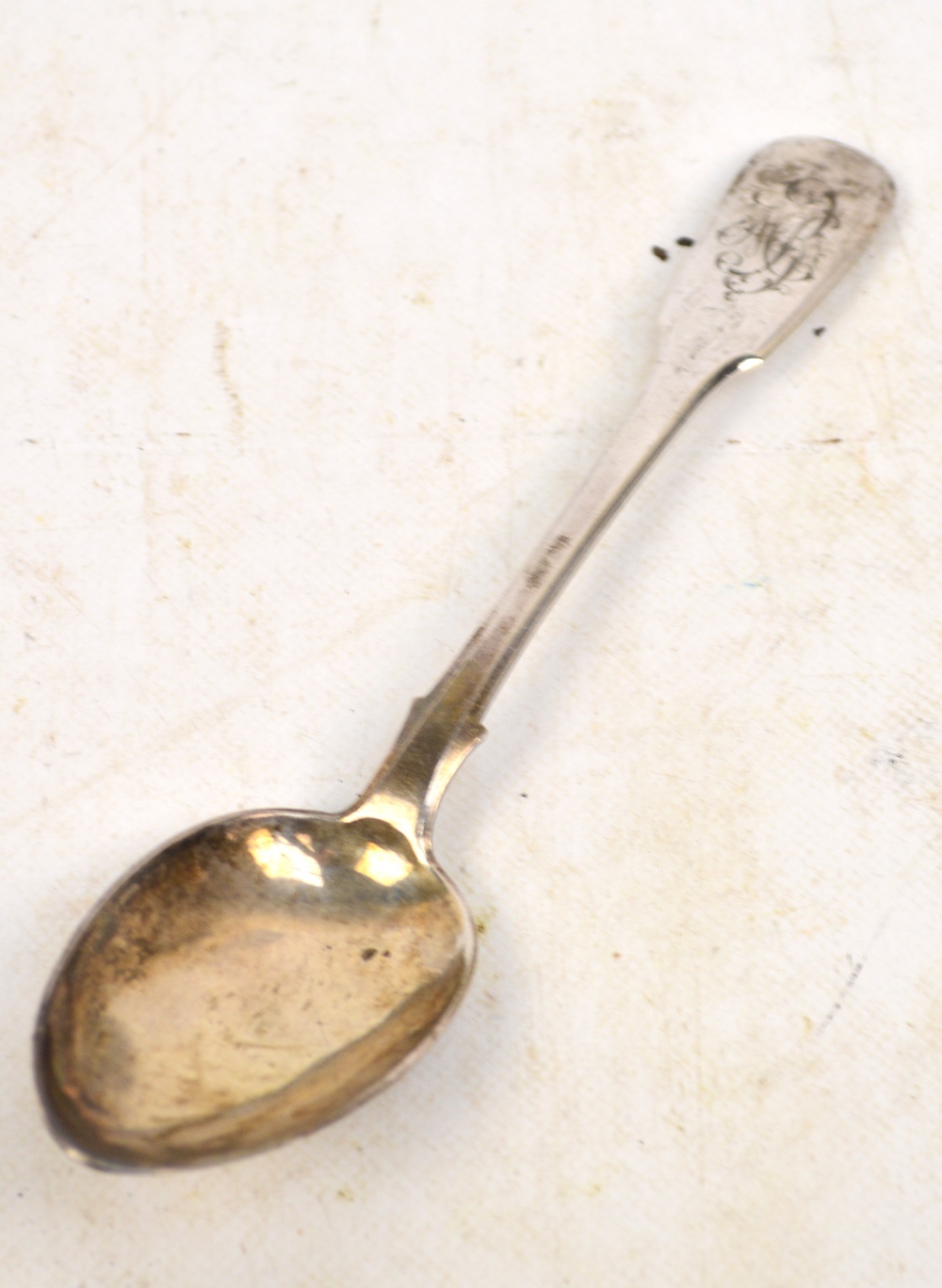 A late 19th century Russian silver table spoon engraved "MB" to the terminal, Firm of Sazikov,