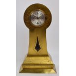 A decorative brass balloon shaped mantel clock,