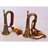 A brass bugle and a copper and brass bugle (2).