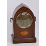 An Edwardian mahogany boxwood and satinwood inlaid lancet shaped mantel clock,