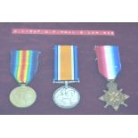 A framed and glazed trio of WWI medals awarded to 2.Lieut. G.P.Hall. S.Lan.Reg.