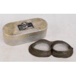 A pair of German WWII goggles contained within original tin inscribed "Deyea, 28.11.