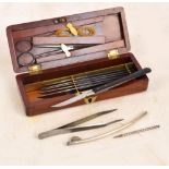 A late 19th century mahogany cased minor surgery set by Arnold of London including brass scalpel