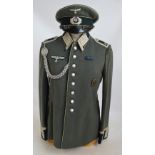 A period German Third Reich "Infantry Feldwebel Waffenrock" and cap,