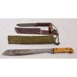 A Martingdale of Birmingham military issued knife inscribed 1971 with canvas scabbard and wooden