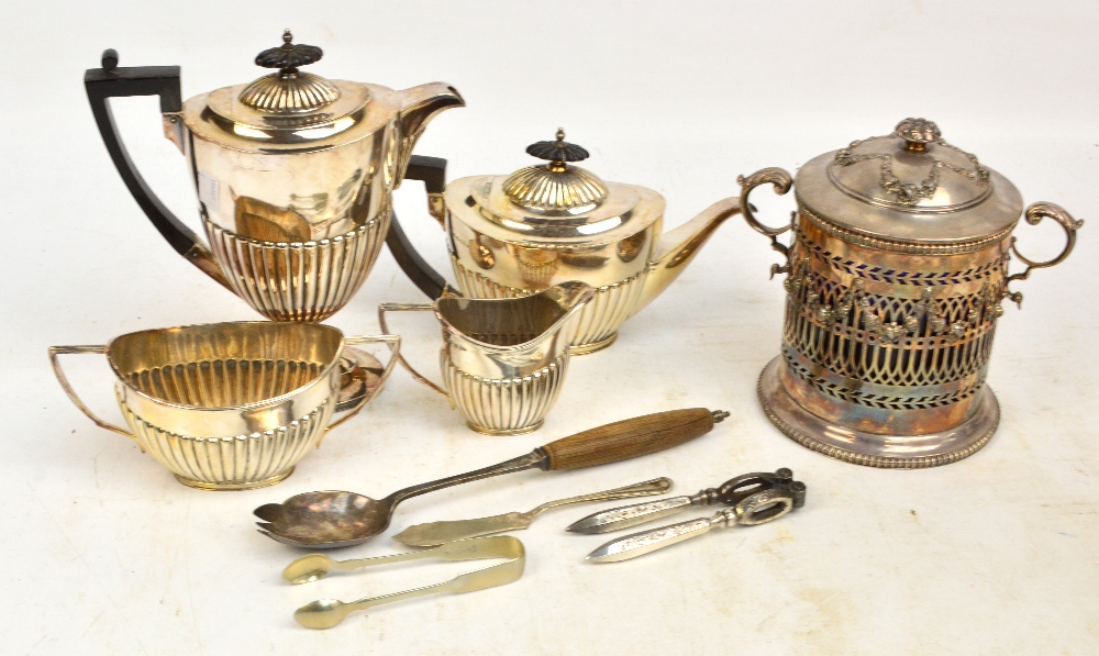 An electroplated four piece tea service with part gadrooned decoration comprising a teapot,