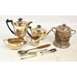 An electroplated four piece tea service with part gadrooned decoration comprising a teapot,