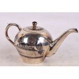 An early 20th century Iraqi silver and niello globular teapot decorated with Middle Eastern