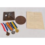 A WWI medal trio comprising the 1914 Star, the Victory Medal and the British War Medal,