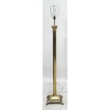 A contemporary brass Corinthian column fluted standard lamp.