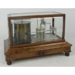 An early 20th century walnut cased barograph by Short & Mason of London, with bevelled glass,