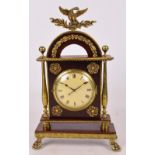 An unusual Regency mahogany and brass cased sedan clock in ornate frame,