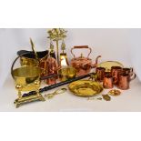 A collection of copper and brass including a swing handled coal scuttle, copper kettle,