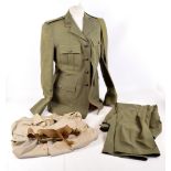 A lightweight Royal Marines jacket with trousers and tropical stone shirt.