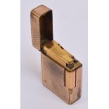A St Dupont rolled gold lighter with overall engine turned decoration, 4.7 x 3.5cm.