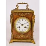 An oversized 19th century walnut and gilt metal mounted carriage clock,