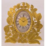 An unusual late 19th century gilt metal thirty hour easel backed mantel clock,