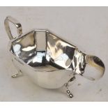 A George VI hallmarked silver Art Deco style sauce boat of shaped form, Viners, Sheffield 1938,