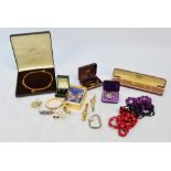 A quantity of costume jewellery including a pair of 9ct gold earrings, 9ct gold and pearl earrings,