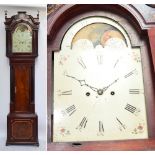 An early 19th century mahogany and crossbanded longcase clock,