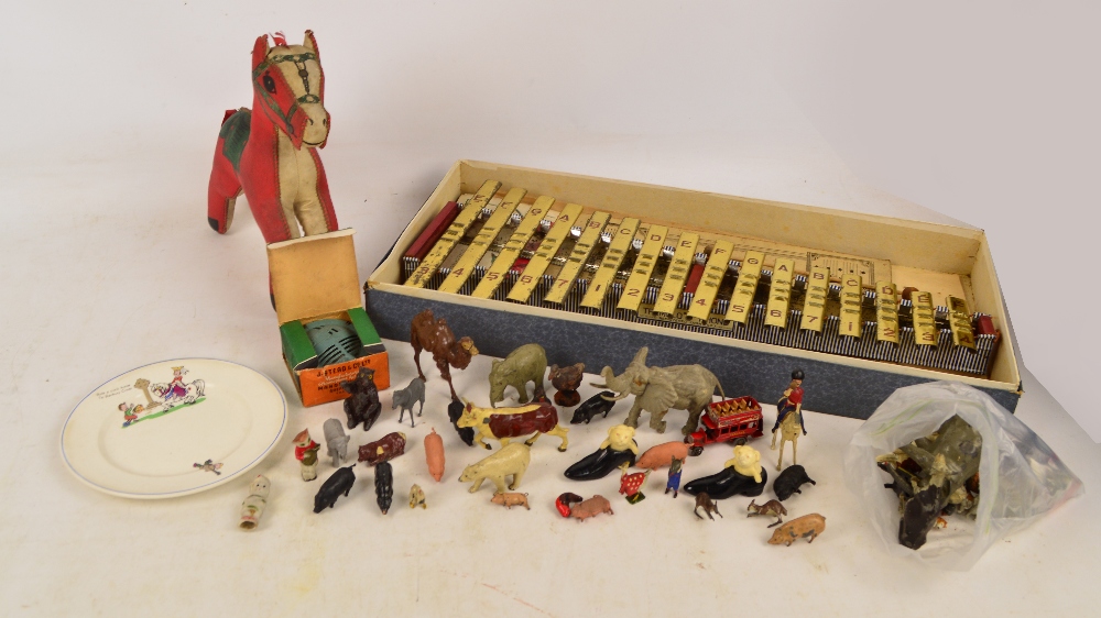 A collection of various lead and resin animal figures, a vintage horse, a boxed "Tremolo-Phone",