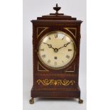 A Regency mahogany, brass and boxwood inlaid bracket clock,