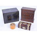 A miniature mahogany chest of two short above two long drawers, width 20cm,