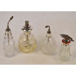 Four silver mounted clear cut glass atomisers to include Birmingham 1925, height 13.