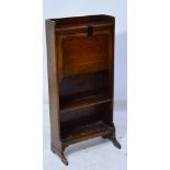 A mid 20th century dark oak student bureau, width 56cm, height 118cm.