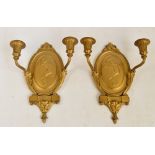 A pair of gilt metal two branch wall sconces,