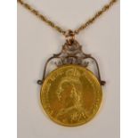 A Victorian double sovereign, 1887, with soldered yellow metal scroll wire mounts,