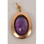 A Victorian 15ct yellow gold oval faceted amethyst pendant with seed cultured pearl decorated