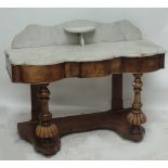 A Victorian walnut marble topped wash stand with serpentine front, central drawer,