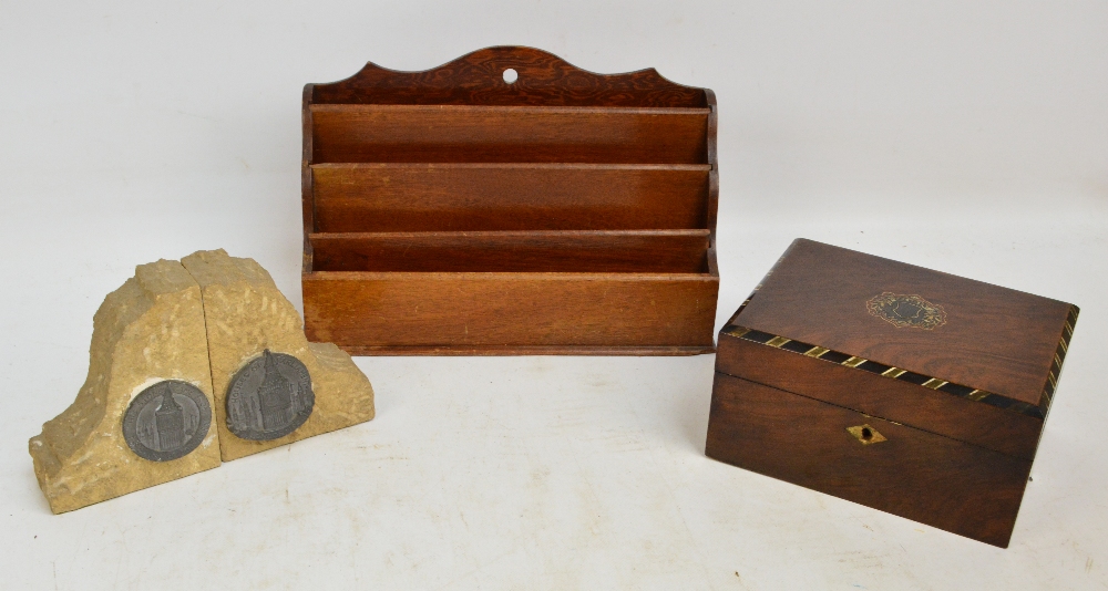 A walnut sewing box of rectangular form with brass, ivory and ebony detailed upper edge,