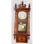 An oak and walnut inlaid wall clock,