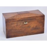 An early Victorian mahogany tea caddy of rectangular form with panelled hinged lid enclosing three