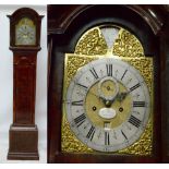 An early 18th century walnut longcase clock,