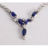 An 18ct white gold Ceylon sapphire and diamond set necklace,