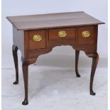 A George III oak lowboy,