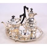 A silver plated four piece tea set comprising a teapot, length including spout and handle 28cm,