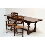 A Victorian oak refectory table on turned ring and baluster stretchered supports to block feet,